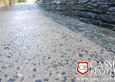 Exposed Concrete Floor with Blue Gravel